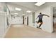 Basement area showcases murals of athletes playing sports at 2252 S Queen St, Lakewood, CO 80227