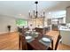 Spacious open-concept showcasing the dining, kitchen and living room combination at 8426 W Woodard Dr, Lakewood, CO 80227
