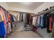 Spacious walk-in closet with ample hanging space and shelving for optimal organization at 13205 E 109Th Ave, Commerce City, CO 80022