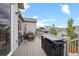 Enjoy outdoor dining on this deck, with a grill, dining table, and views of the neighborhood at 756 Ranchhand Dr, Berthoud, CO 80513