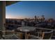 Balcony with city and mountain views at night at 800 N Pearl St # 1201, Denver, CO 80203