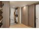 Large walk-in closet with built-in shelving and drawers at 800 N Pearl St # 1201, Denver, CO 80203