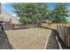 Spacious backyard featuring a lawn and a wooden fence at 19954 E Dartmouth Ave, Aurora, CO 80013