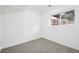 Bright bedroom with carpet, offering a simple and inviting space at 19954 E Dartmouth Ave, Aurora, CO 80013