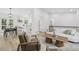 Open concept living space with contemporary design, seamlessly blending living and dining areas for modern living at 19954 E Dartmouth Ave, Aurora, CO 80013