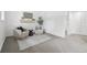 Modern living area with comfortable seating, stylish decor, and natural light at 19954 E Dartmouth Ave, Aurora, CO 80013
