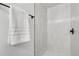 Modern glass-enclosed shower with white tiled walls at 19954 E Dartmouth Ave, Aurora, CO 80013