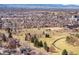 Expansive aerial view of the neighborhood with distant mountain views and open green space at 2600 S Sherman St, Denver, CO 80210