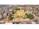 Aerial view of neighborhood with a large grass park at 2600 S Sherman St, Denver, CO 80210