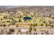Scenic aerial view of the city with a golf course and pond at 2600 S Sherman St, Denver, CO 80210