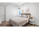 Bedroom featuring a queen-sized bed with neutral decor and soft lighting at 2600 S Sherman St, Denver, CO 80210