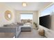 Cozy living room with a large sectional sofa, a view, and modern decor at 2600 S Sherman St, Denver, CO 80210