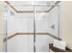 Modern glass enclosed shower with tile accents and sleek fixtures at 2600 S Sherman St, Denver, CO 80210