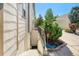 Exterior basement entrance with concrete steps and metal railing at 3357 N Akron Ct, Denver, CO 80238