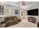 This spacious bonus room provides ample room for relaxation and recreation at 3357 N Akron Ct, Denver, CO 80238