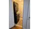 Convenient laundry room with stacked washer and dryer, maximizing space at 3357 N Akron Ct, Denver, CO 80238