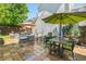 Picturesque outdoor patio with dining and lounge seating at 3357 N Akron Ct, Denver, CO 80238