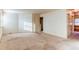 Expansive bedroom featuring neutral carpet, multiple closets, and ample natural light, perfect for relaxation at 1530 S Quebec Way # 29, Denver, CO 80231