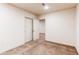 Bright bedroom showcasing neutral tones, carpet, and large closet, offering a cozy and inviting space at 1530 S Quebec Way # 29, Denver, CO 80231
