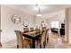 Dining room connects seamlessly to living area, perfect for modern living, with seating for six at 1530 S Quebec Way # 29, Denver, CO 80231