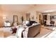 Open-concept living area with hardwood floors, comfortable seating, and ample natural light at 1530 S Quebec Way # 29, Denver, CO 80231