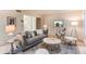 Relaxing living area featuring stylish decor, cozy seating, and ample natural light at 1530 S Quebec Way # 29, Denver, CO 80231