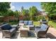 Backyard patio with comfortable seating, perfect for enjoying the beautiful weather and outdoor entertaining at 919 Taylor Ln, Erie, CO 80516
