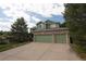 Charming green home with a three car attached garage, perfect for a Gathering at 919 Taylor Ln, Erie, CO 80516