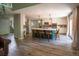 Kitchen features an island with seating, modern appliances, and ample counter space for food preparation and entertainment at 919 Taylor Ln, Erie, CO 80516