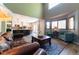 Open-concept living area showcasing seamless transition to a kitchen, creating an inviting space for gatherings at 919 Taylor Ln, Erie, CO 80516