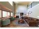 Cozy living room features a fireplace and plush seating, offering a comfortable space for relaxation and Gathering gatherings at 919 Taylor Ln, Erie, CO 80516