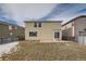 The backyard of the home shows the patio area and the lawn at 5423 Ben Park Cir, Parker, CO 80134