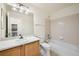 Cozy full bathroom featuring a single sink vanity and a shower/tub at 5423 Ben Park Cir, Parker, CO 80134