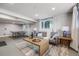 Finished basement with flexible space, a ping pong table and lots of natural light at 2764 S Reading Ct, Denver, CO 80231