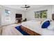 Comfortable bedroom with natural light, neutral decor, and a relaxing ambiance for a restful sleep at 2764 S Reading Ct, Denver, CO 80231