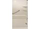 Shower/tub combo with tiled walls and marble shelves at 7995 E Mississippi Ave # F11, Denver, CO 80247