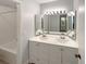 Bathroom boasts a double vanity and updated fixtures at 7995 E Mississippi Ave # F11, Denver, CO 80247