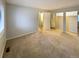 Spacious bedroom with carpet flooring and mirrored closet at 7995 E Mississippi Ave # F11, Denver, CO 80247