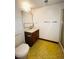 Bathroom featuring a toilet, vanity, and shower with sliding door, all with a clean aesthetic at 19954 E Dartmouth Ave, Aurora, CO 80013