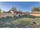 Wide fenced backyard provides privacy and plenty of room for outdoor activities and potential gardening at 3224 Troy St, Aurora, CO 80011