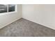 Basement with neutral carpeting and a window at 3125 S Gibralter St, Aurora, CO 80013