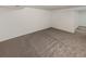 A bedroom features neutral paint, carpet and a sliding closet door at 3125 S Gibralter St, Aurora, CO 80013