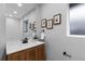 Stylish bathroom with a single sink and updated fixtures at 30 S Yates St, Denver, CO 80219