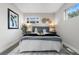 Cozy bedroom with neutral decor and ample natural light at 30 S Yates St, Denver, CO 80219