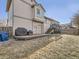 Backyard with deck and grilling area at 9125 Bell Flower Way, Highlands Ranch, CO 80126