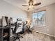 Home office with two workstations and window at 9125 Bell Flower Way, Highlands Ranch, CO 80126