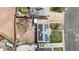Overhead drone shot of home's roof with solar panels, along with the backyard and a detached garage at 3341 W 94Th Ave, Westminster, CO 80031