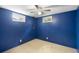 Cozy bedroom with blue walls, carpet and two windows allowing ample natural light at 3341 W 94Th Ave, Westminster, CO 80031