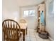 Charming dining area with a table and chairs bathed in natural light at 4354 Chase St, Denver, CO 80212