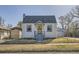 Charming one-story home with an attached garage and well-kept landscaping at 4354 Chase St, Denver, CO 80212